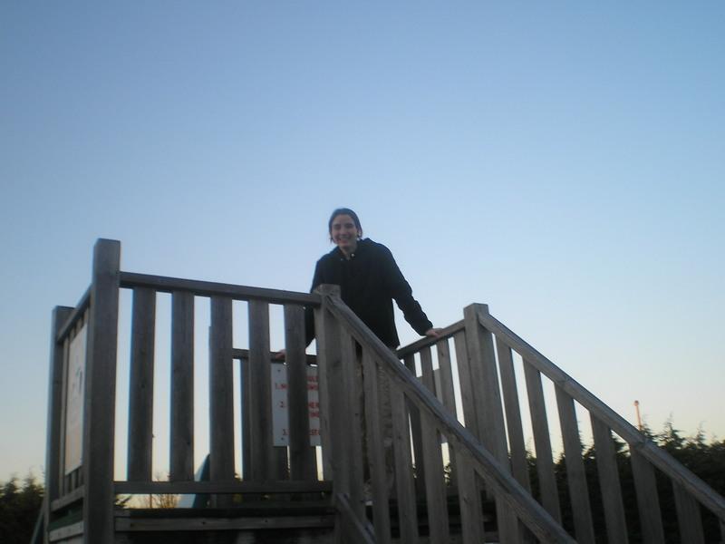 Kath on top of the steps leading to the slide