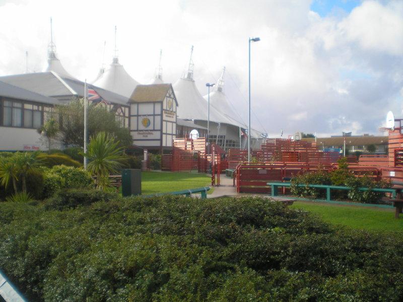 Sports area with the Sun & Moon pub and Skyline in the background