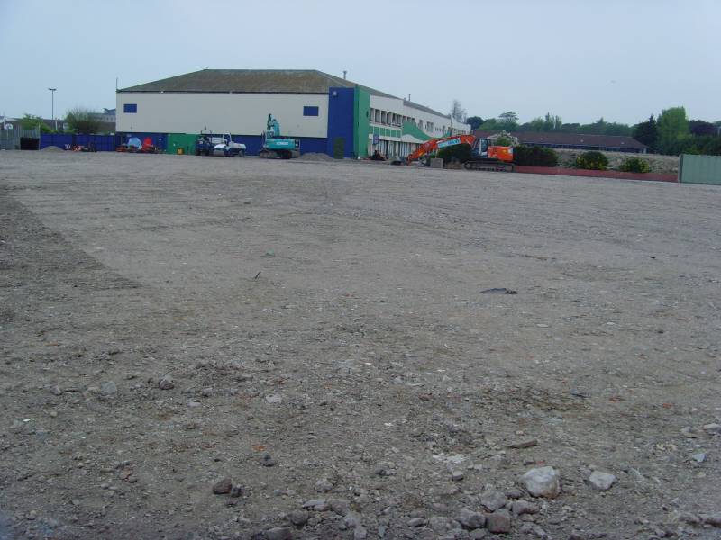 The space in the foreground used to house the boating lake. The old reception building can be seen in the background.