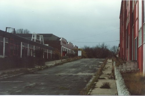 Beachcomber building on the right with the site of the old fairground on the left. The building at the top of the hill on the left is the French Bar
