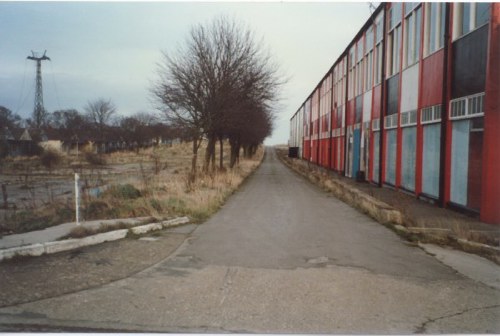The road leading to the beach. Gaiety building on the right and Yellow Camp on the left. Some of the original 1940s chalets used to stand in the area to the left but were demolished during the Amtree Park days to provide car parking. Note the chairlift pylon with the cables hanging down