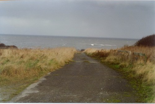 The road leading down to the beach gate