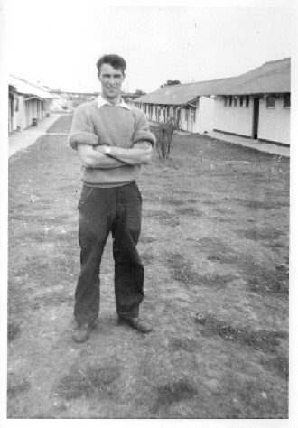 Eddie Whitehead stood near the chalets 1959