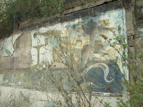 Old mural on remaining wall of indoor pool